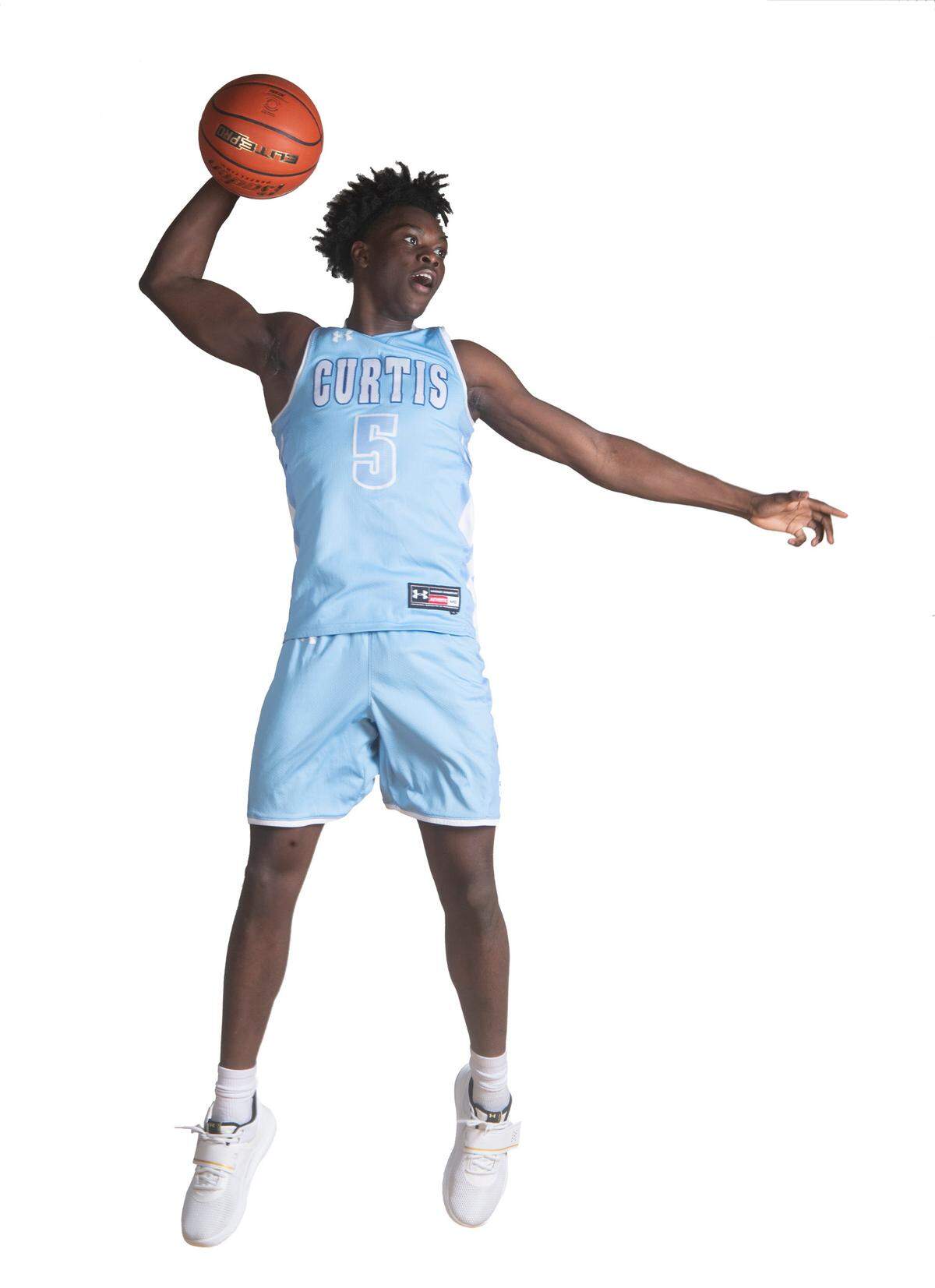 Curtis junior Zoom Diallo is The News Tribune’s All Area Boys Basketball Player of the Year. He is photographed at Curtis High School in University Place, Washington, on Saturday, March 11, 2023.