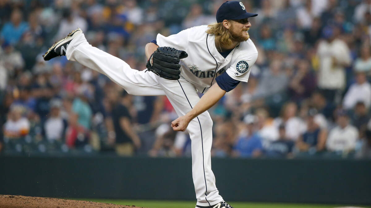 Seattle Mariners pitcher Ross Detwiler follows through on a pitch against the Houston Astros during the third inning of a baseball game Tuesday, Aug. 21, 2018, in Seattle. (AP Photo/Jennifer Buchanan)