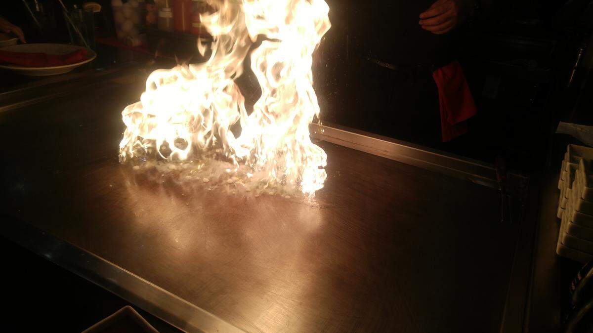 Fire and spatula theatrics are common themes at Sapporo Japanese Steakhouse & Sushi in University Place.