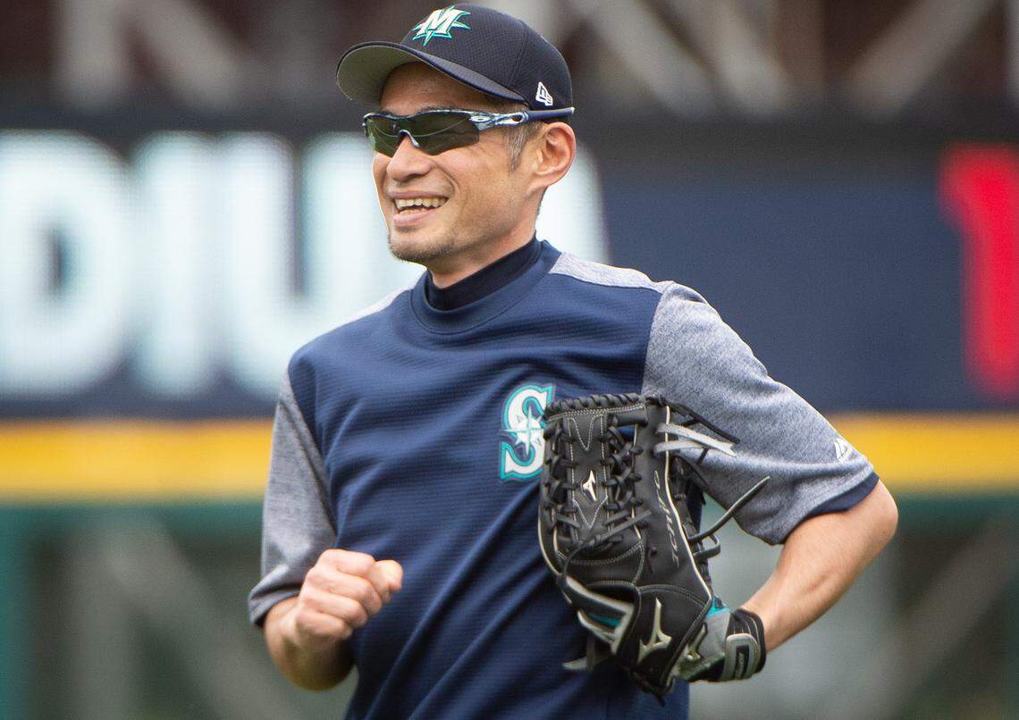 Ichiro Suzuki smiles as he warms up with players before the game. The Tacoma Rainiers played the Fresno Grizzlies in a Minor League baseball game at Cheney Stadium in Tacoma, Wash., on Tuesday, May 21, 2019.