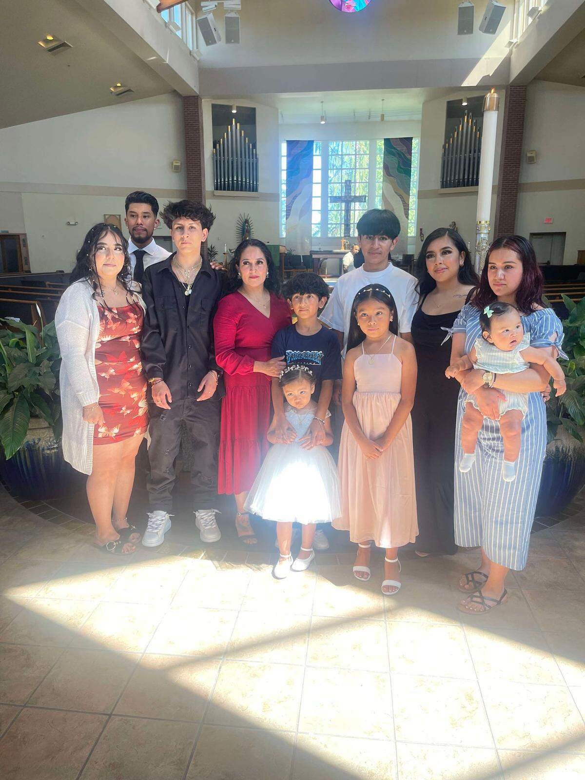 Jonathan Tovar and his family at church celebrating his niece’s baptism.