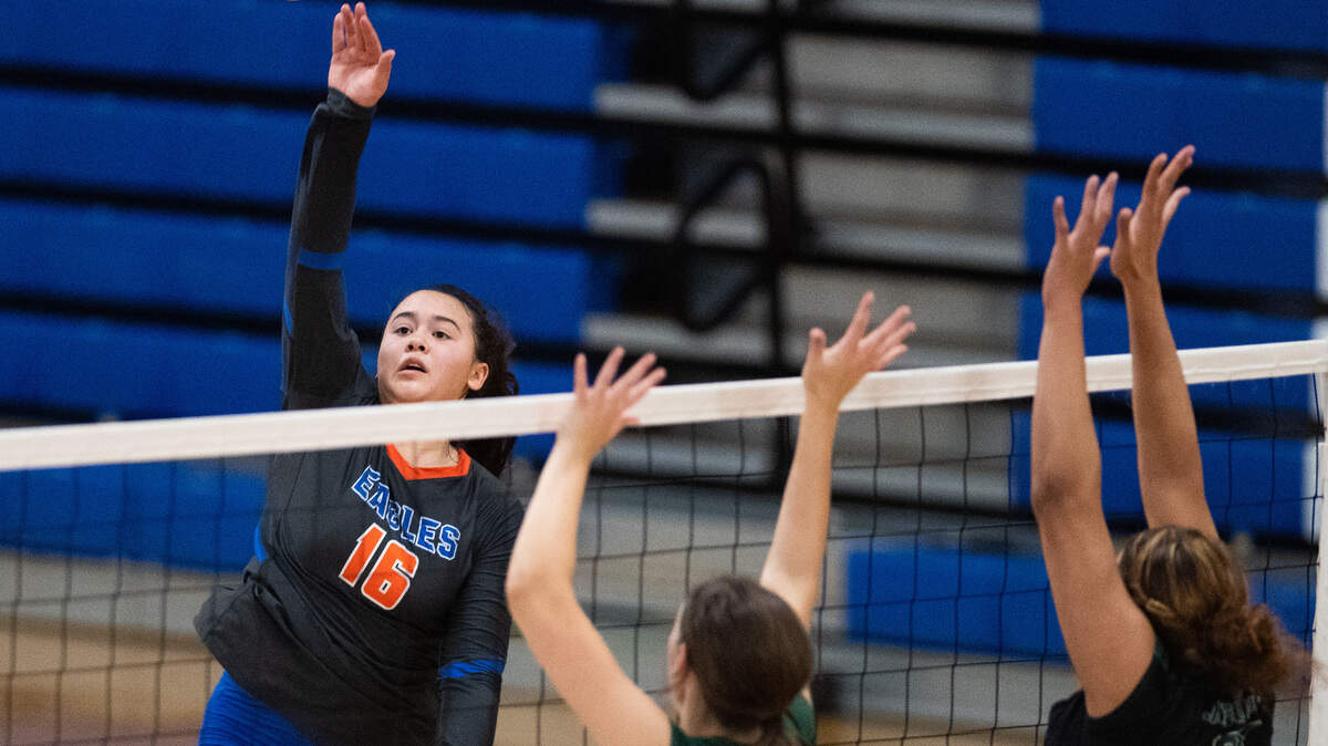 Graham Kapowsin Hailey Brockway goes for a spike during the first set. Graham-Kapowsin played Emerald Ridge in the 4A West Central District Final at Curtis High School in Tacoma, Wash., on Saturday, Nov. 16, 2019.
