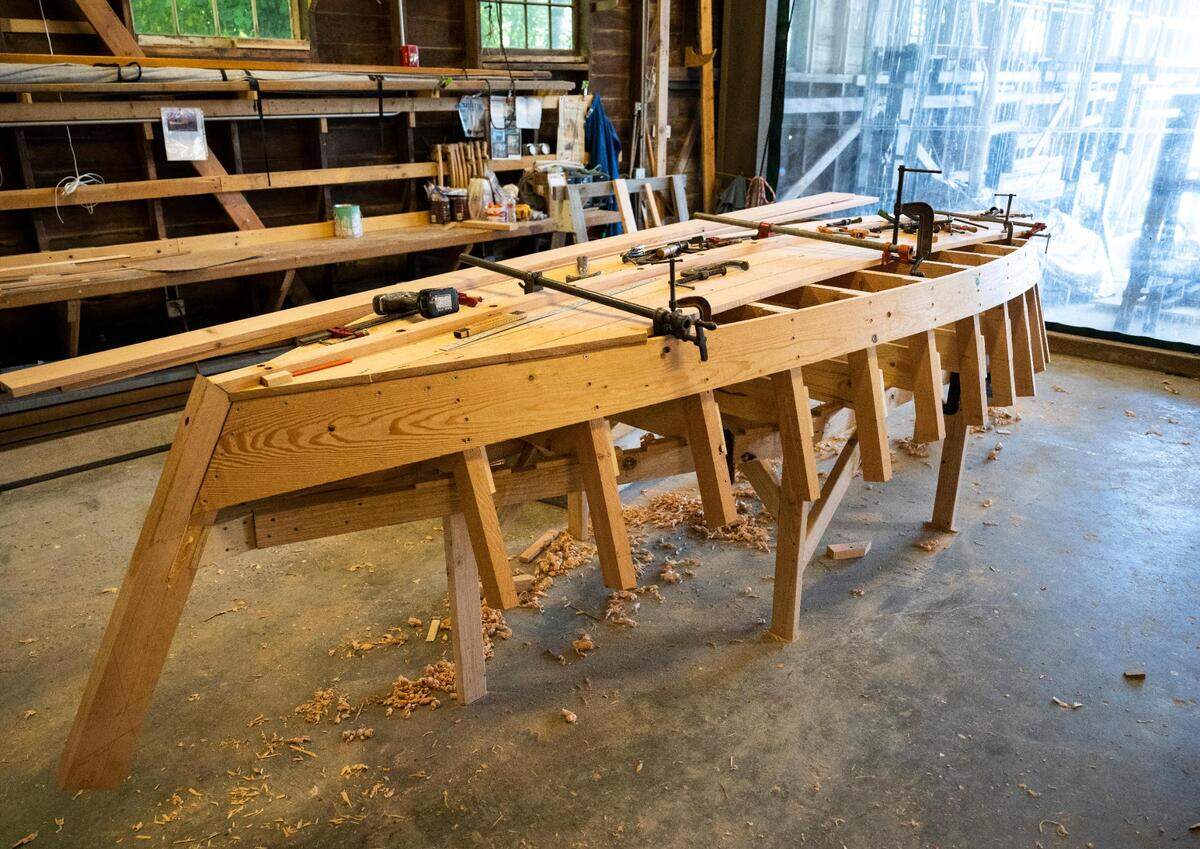 A Croatian fishing boat that is being built as part of “The Batana Project” at the Gig Harbor Boat Shop in Gig Harbor, Wash. on Wednesday, July 20, 2022. Once the boat is complete, the boat shop will host an event to reveal it Sept. 3.