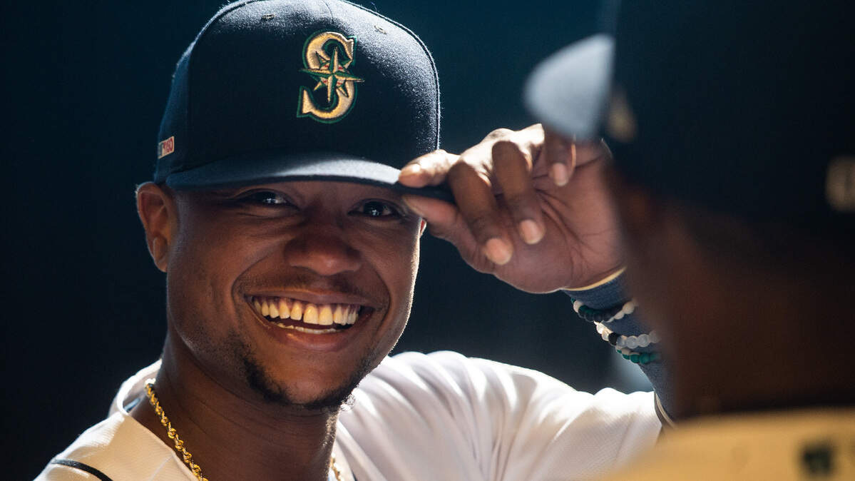 Shortstop Tim Beckham shares a laugh with Dee Gordon while in the tunnel waiting for player introductions before the game. The Seattle Mariners played the Boston Red Sox in a Major League Baseball game at T-Mobile Park in Seattle, Wash., on Thursday, March 28, 2019.