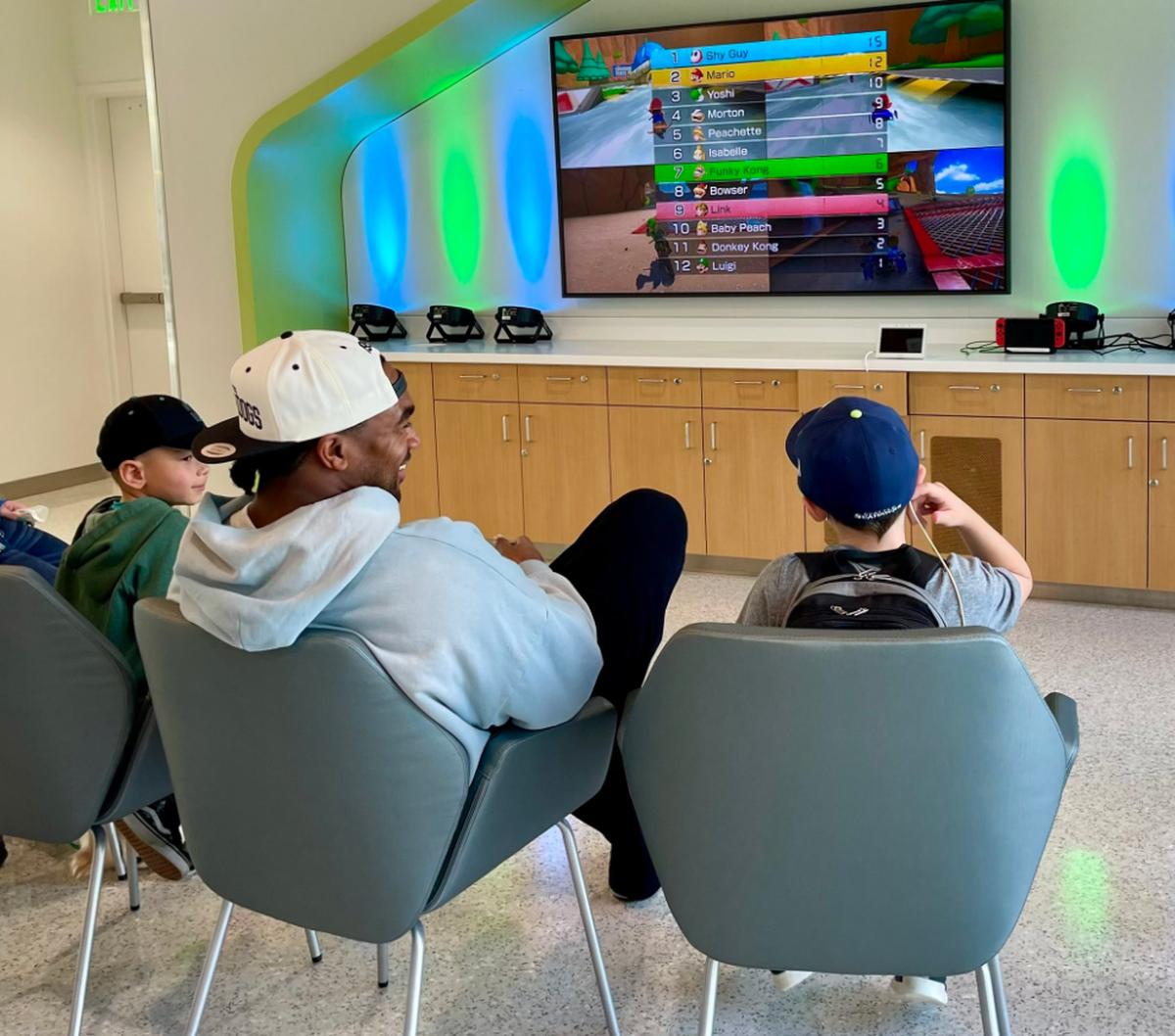 Seahawks linebacker Tyrel Dodson spent his team off day Monday, Sept. 17, 2024, playing the Mario Kart video game and visiting with patients at Seattle Children’s Hospital, in its Therapeutic Gaming unit. 