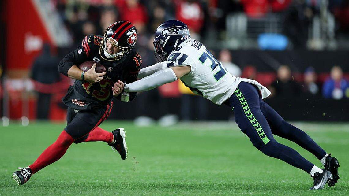 Defense dominates 49ers, Seahawks win NFC West, top seed in 13-3 win