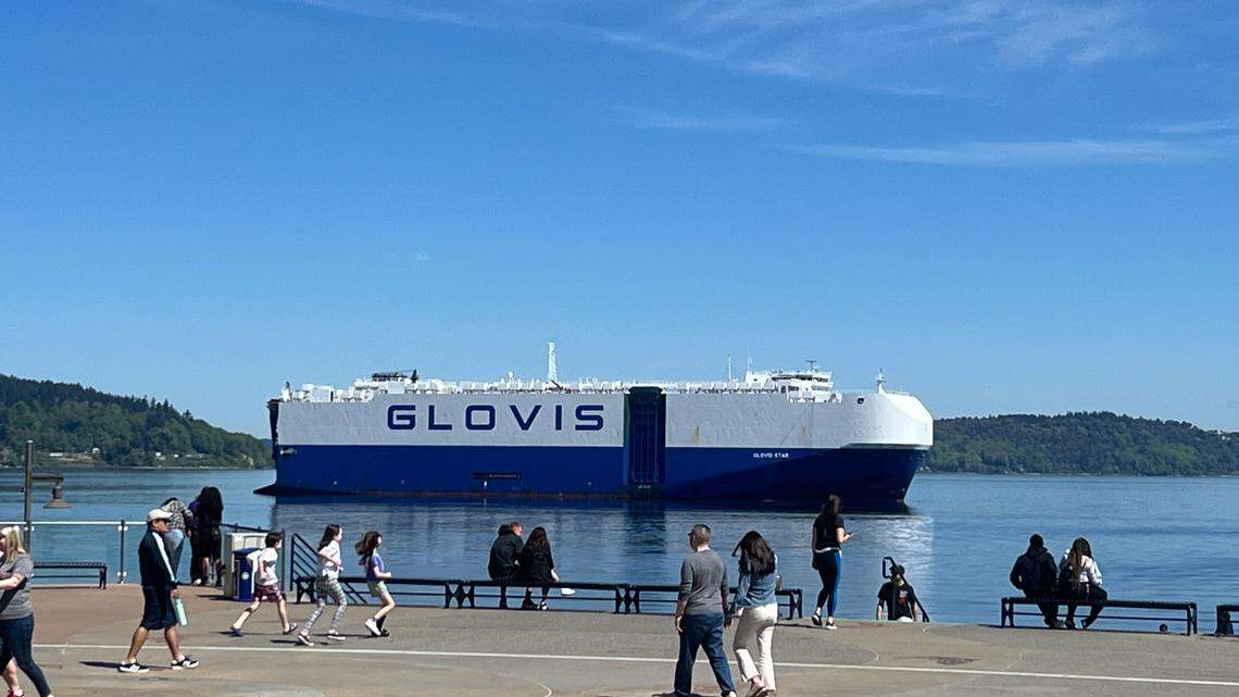 The Glovis Star, a massive vehicle carrier containing Hyundais and Kias, waits in Commencement Bay along Point Ruston Saturday, April 25, 2026.