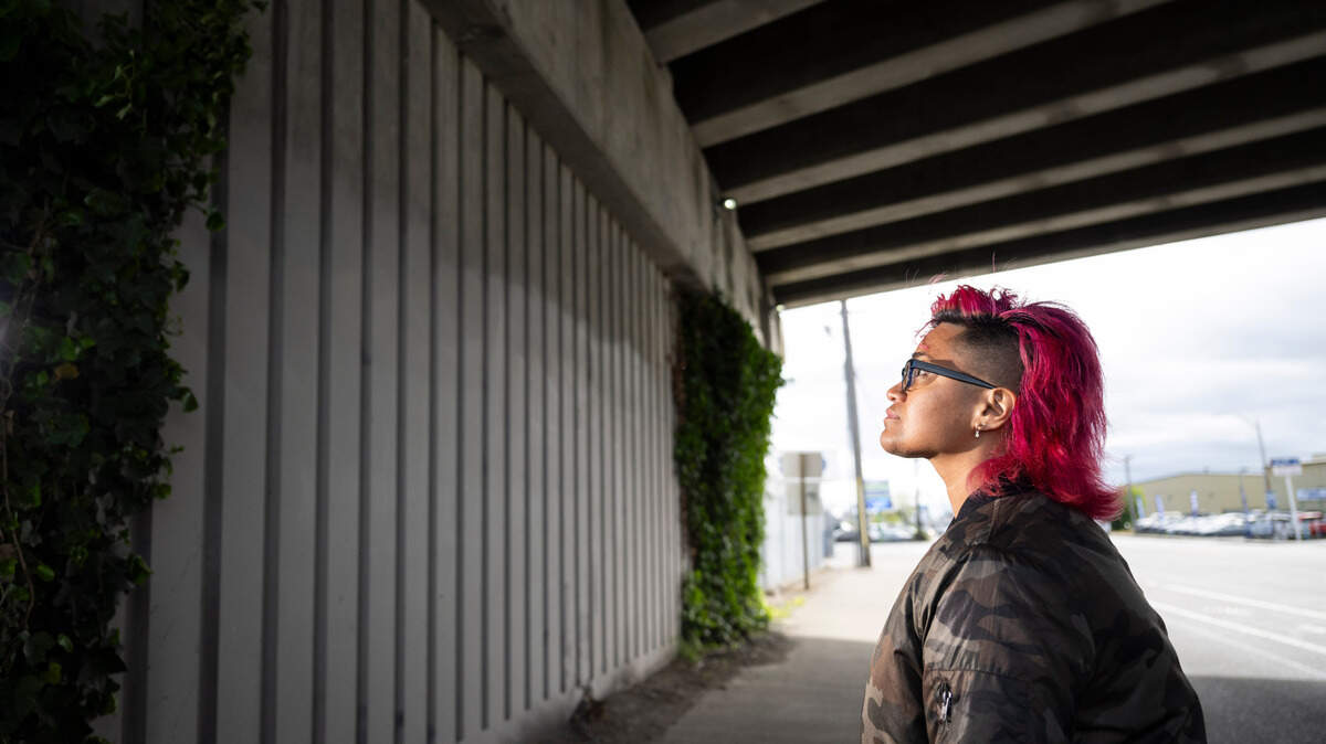 Muralist Nofo Porter poses for a portrait at the future site of a mural on the Union Avenue overpass on South Tacoma Way, on Thursday, May 16, 2024, in Tacoma.