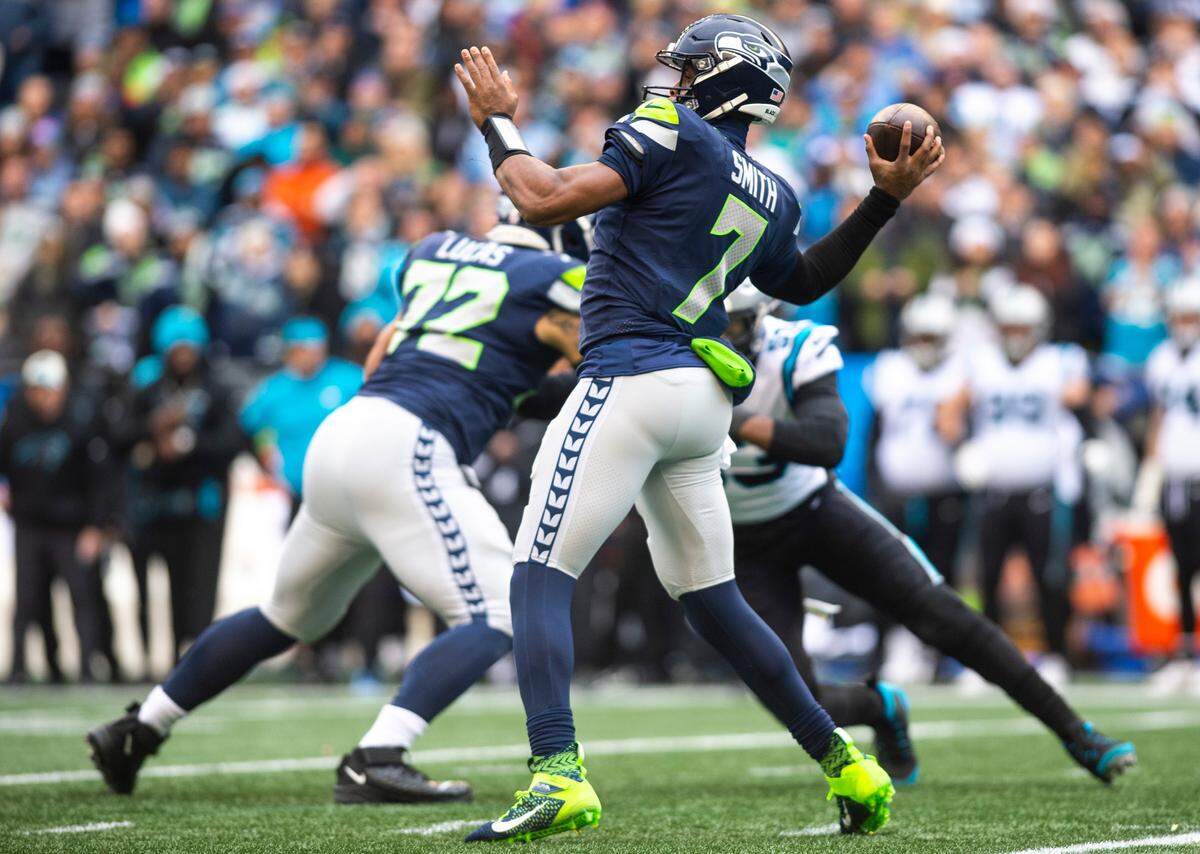 Seattle Seahawks quarterback Geno Smith (7) passes the ball in the first quarter of an NFL game against the Carolina Panthers at Lumen Field in Seattle Wash., on Dec. 11, 2022. The Seahawks lost to the Panthers 24-30.