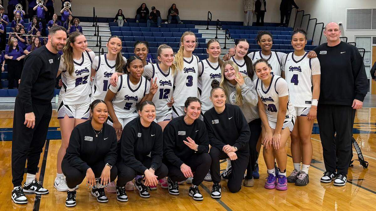 Sumner’s girls basketball team poses for a portrait after capturing a sixth-straight 4A SPSL title with a 52-30 win over Olympia in the championship game on Feb. 7, 2026, at Tacoma Community College.