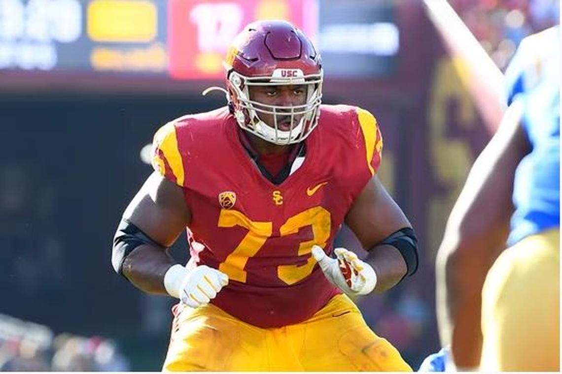 All-Pac-12 left tackle Austin Jackson (73), here pass protecting for USC against UCLA in the Los Angeles Memorial Coliseum in November, is expected to be available in the NFL draft when the Seahawks choose in round one--and perhaps early in round, two if Seattle trades down yet again.