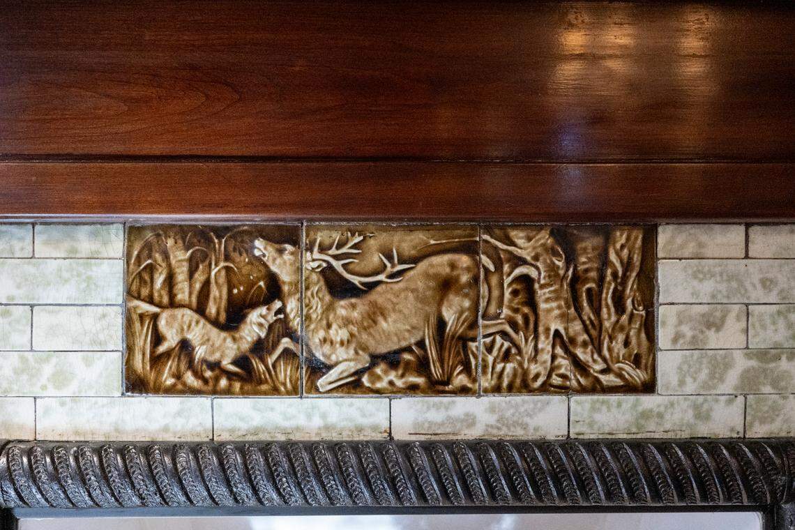 An original fireplace at the historical Hoska House includes an inlaid Czech hunting scene, pictured on Wednesday, April 30, 2025, along North D Street in Tacoma, Wash.