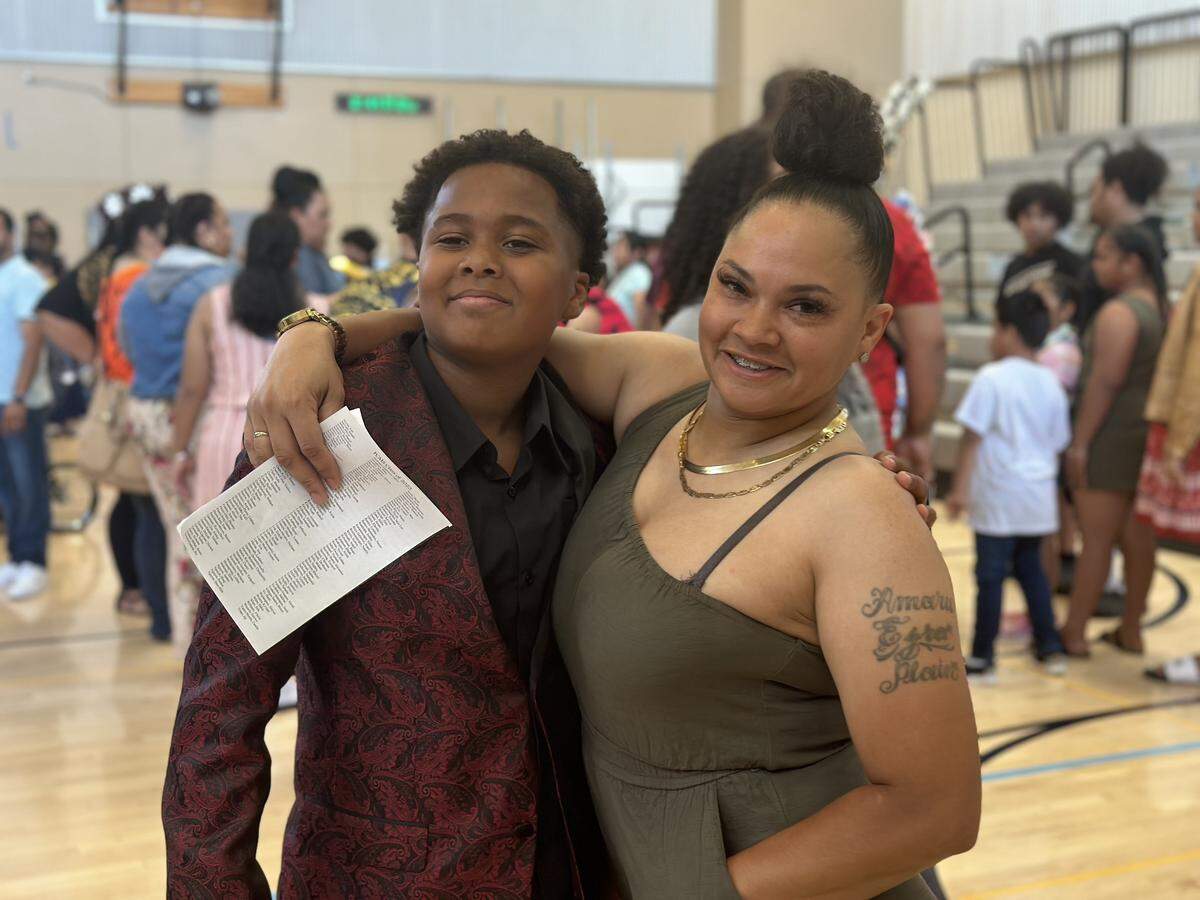 Tamrah Dickman, right, is shown in an undated photo with one of her sons, Juelz Justice, who goes by Ju Ju.