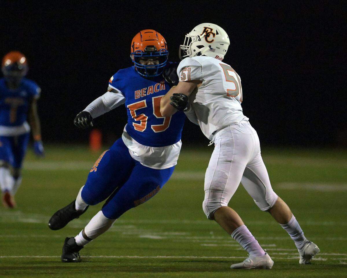 Rainier Beach High School offensive lineman Josh Conerly Jr. (55) is shown in a game against Eastside Catholic.