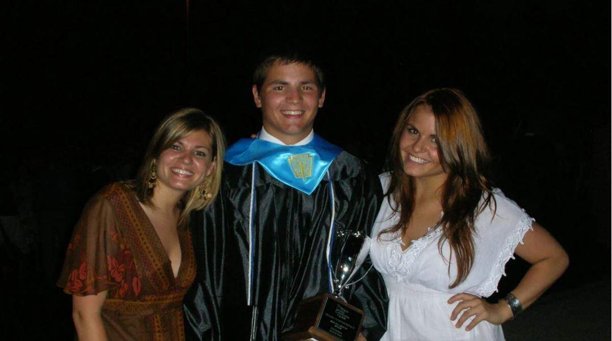 Mike Macdonald with his sisters, Kate and Maggie, after winning the Best All-Around Senior Award at his Centennial High School graduation in Georgia in 2006.