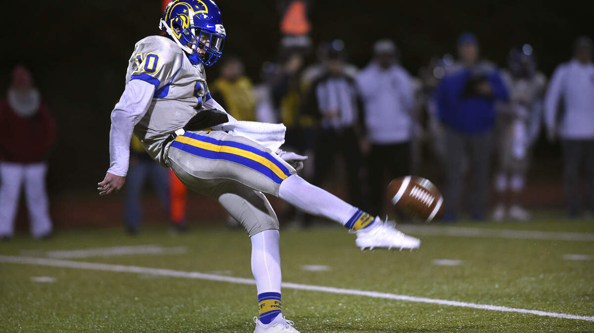 Fife senior punter Gannon Ginnis boots a kick during Friday night’s 2A football state quarterfinal game at Tumwater District Stadium on Nov. 16, 2018.