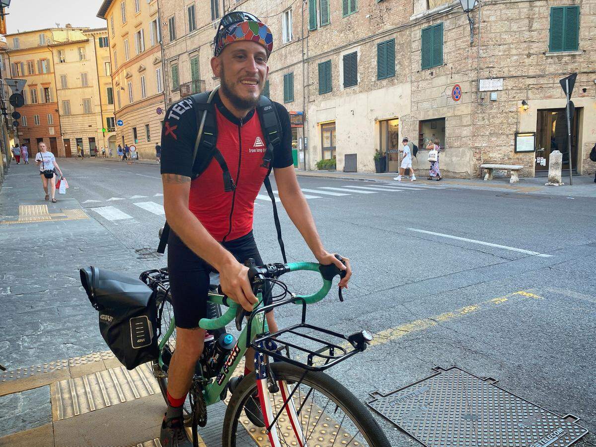 Andrea Franzoni in Siena, Italy on July 19, 2022, halfway through a 4-day training ride in preparation for a bike journey from Washington to Arizona to retrace the route his grandfather traveled as an Italian POW in World War II.