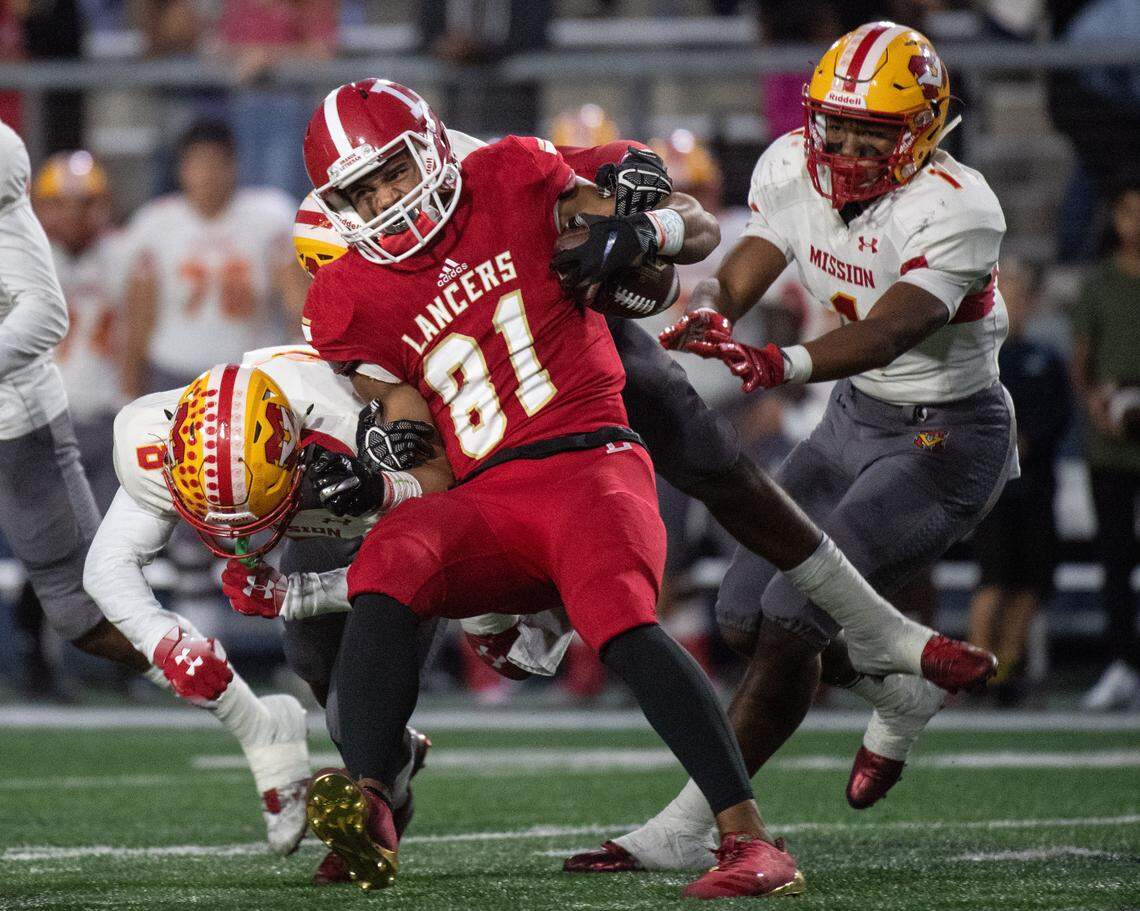 Mission Viejo defenders try to stop Orange Lutheran’s Kyle Ford during a nonleague game at Orange Coast College in Costa Mesa on Friday, September 21, 2018. (Photo by Kyusung Gong/Contributing Photographer)
