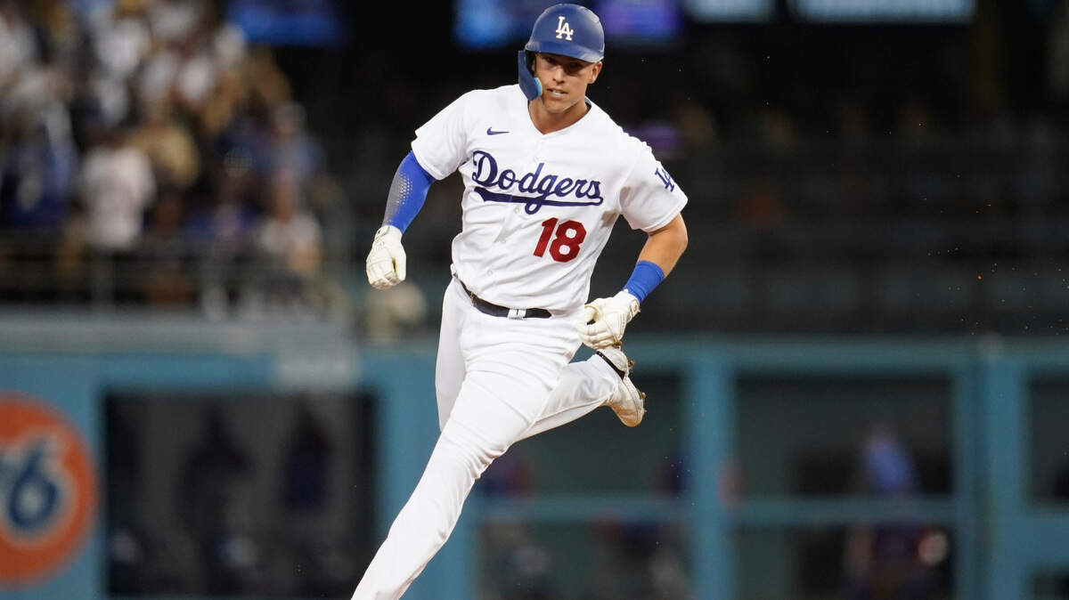 Los Angeles Dodgers’ Jake Lamb (18) runs the bases after hitting a home run during the seventh inning of a baseball game against the Chicago Cubs in Los Angeles, Saturday, July 9, 2022. (AP Photo/Ashley Landis)
