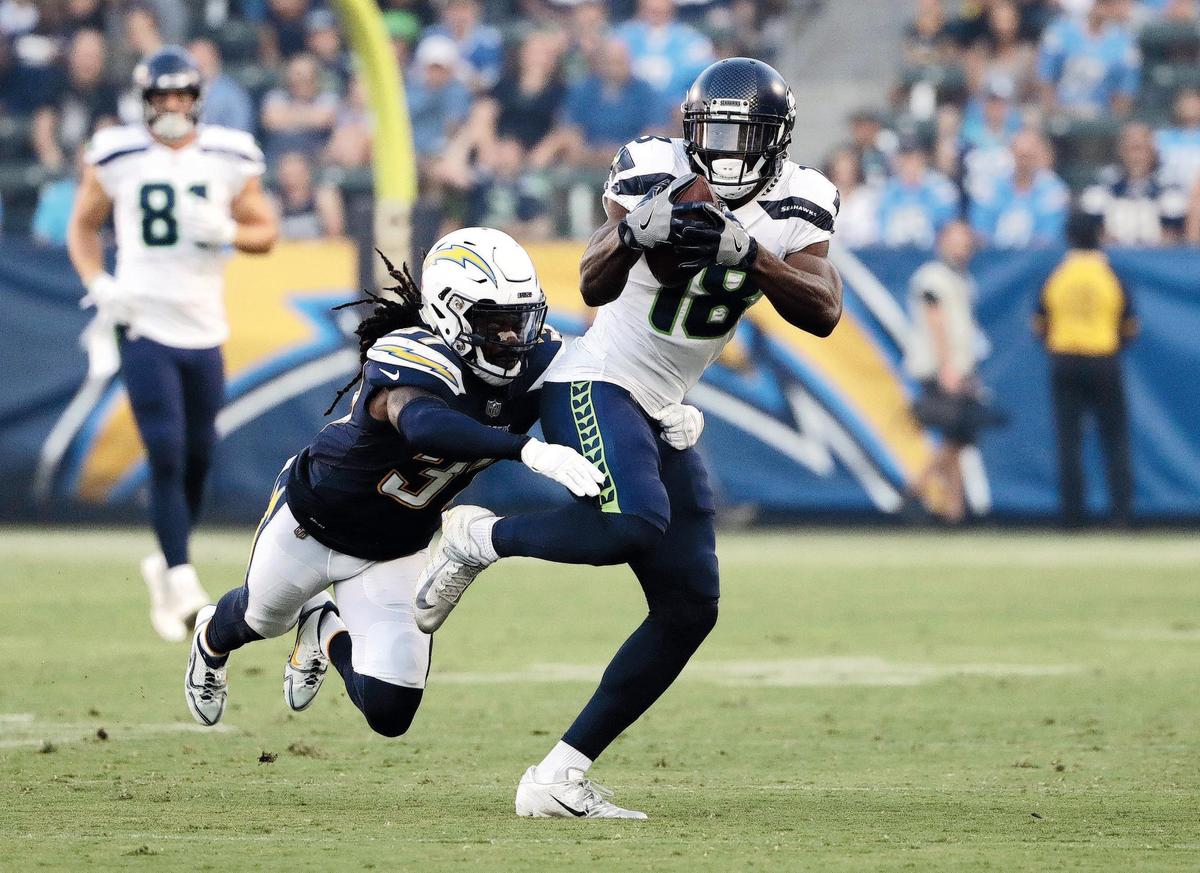 Seahawks wide receiver Jaron Brown (18) was brilliant early in Saturday night’s preseason game at the Los Angeles Chargers. The former Arizona Cardinal signed this offseason caught two passes for 74 of Russell Wilson’s 79 yards passing through the first two drives, but Seattle’s starters trailed Los Angeles’ 14-6 at halftime.