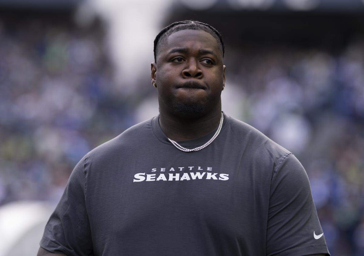 Seattle Seahawks defensive tackle Jarran Reed (90)walks out ahead of the game against the Arizona Cardinals at Lumen Field, on Sunday, Nov. 9, 2025, in Seattle.