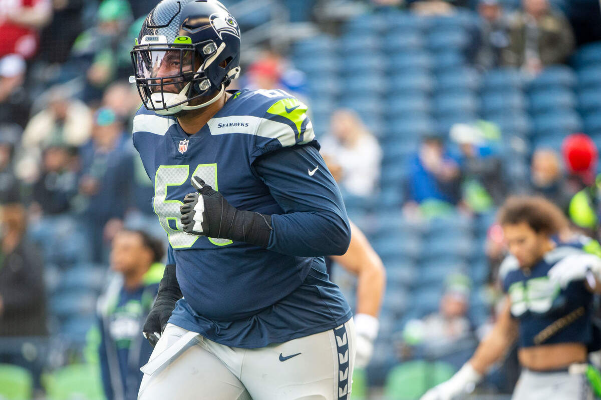 Seattle Seahawks center Kyle Fuller (61) warms up prior to the start of an NFL game against the San Francisco 49ers on Sunday at Lumen Field in Seattle.