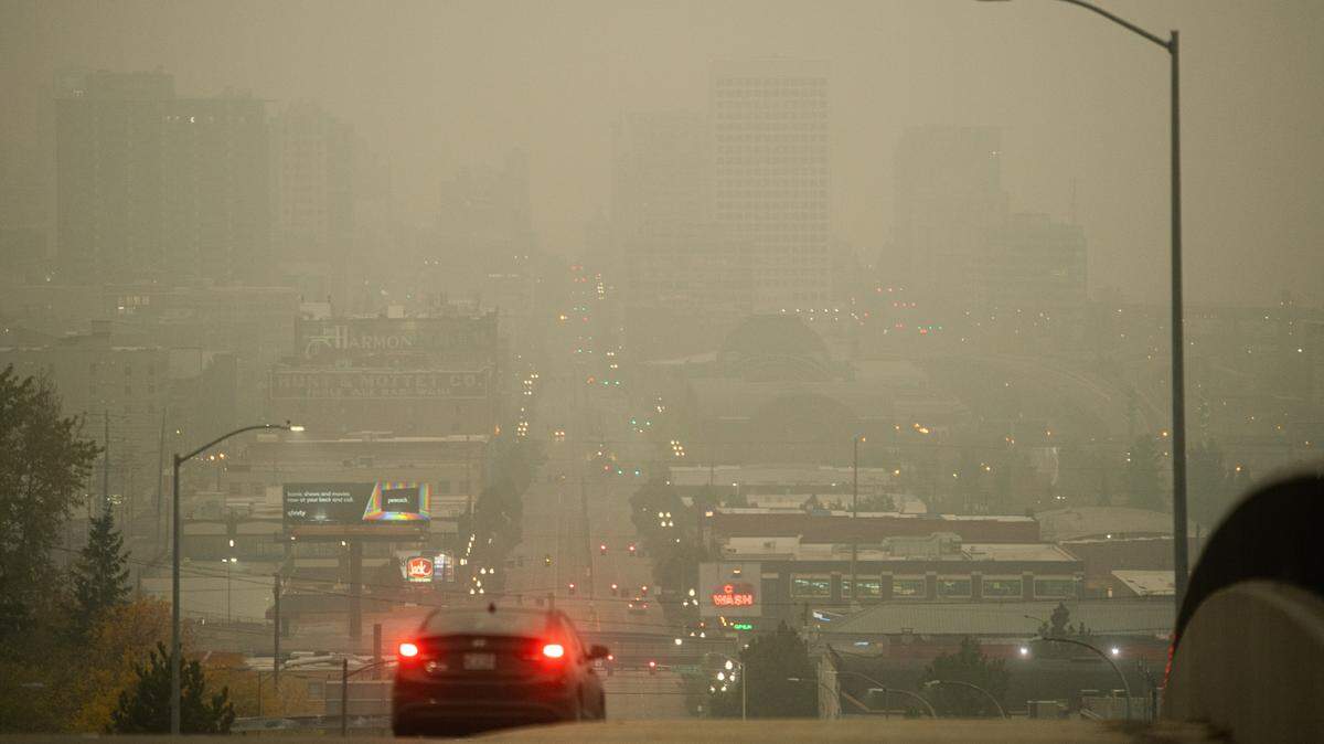 A mixture of heavy smoke and fog blanket downtown Tacoma in this 2020 file photo.