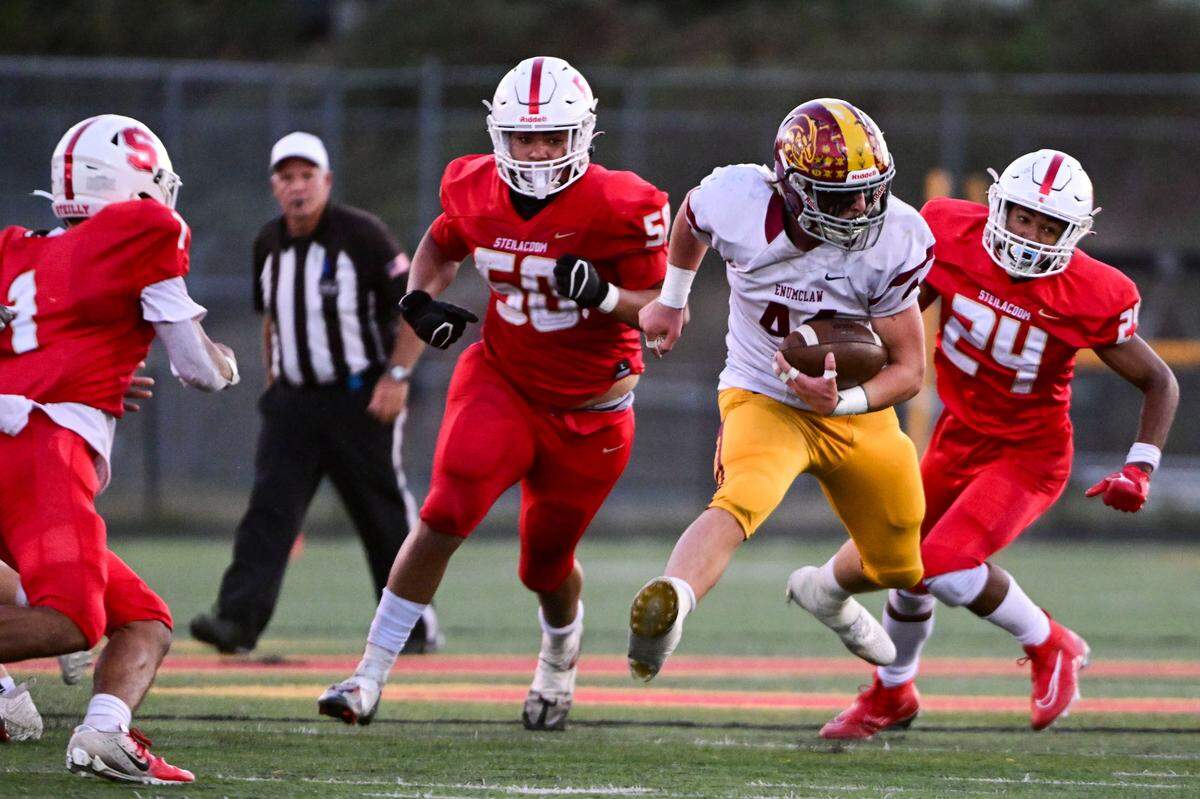 Enumclaw’s Seamus Twohey (44) runs through the Steilacoom defense during the first quarter of a 2A SPSL game on Friday, Sept. 15, 2023, in Steilacoom, Wash.