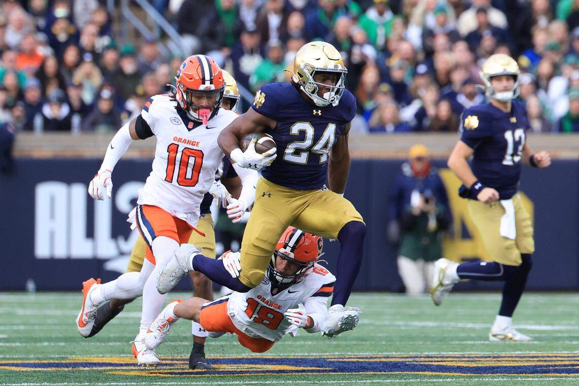 SOUTH BEND, INDIANA - NOVEMBER 22: Jadarian Price #24 of the Notre Dame Fighting Irish runs the ball for a touchdown against the Syracuse Orange during the first quarter at Notre Dame Stadium on November 22, 2025 in South Bend, Indiana. (Photo by Justin Casterline/Getty Images)