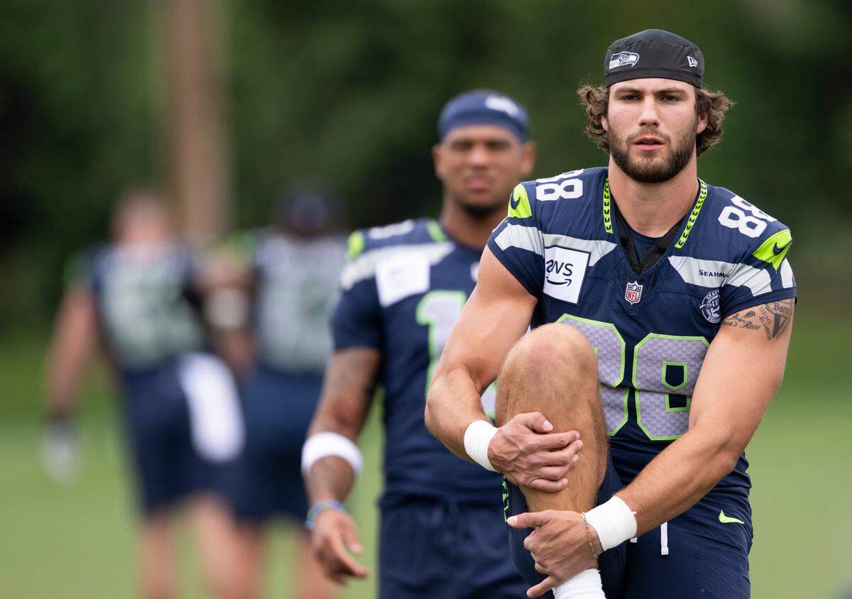 Seattle Seahawks tight end AJ Barner (88) warms up during training camp at Virginia Mason Athletic Center on Friday, July 25, 2025, in Renton, Wash.