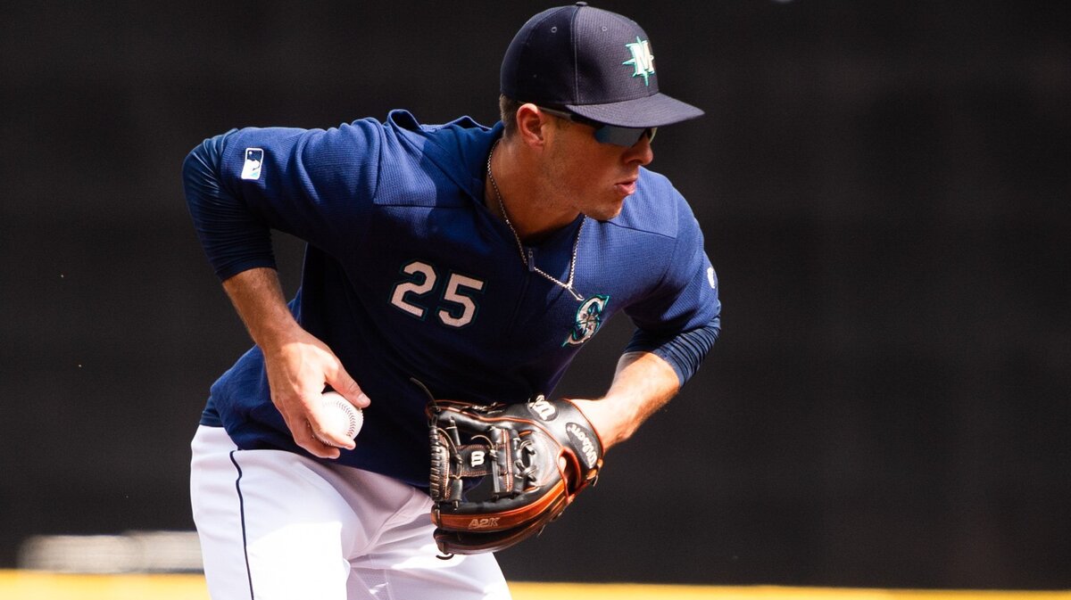 Dylan Moore fields ground balls during Mariners Fan Fest at T-Mobile Park in Seattle, Wash., on Saturday, March 23, 2019.