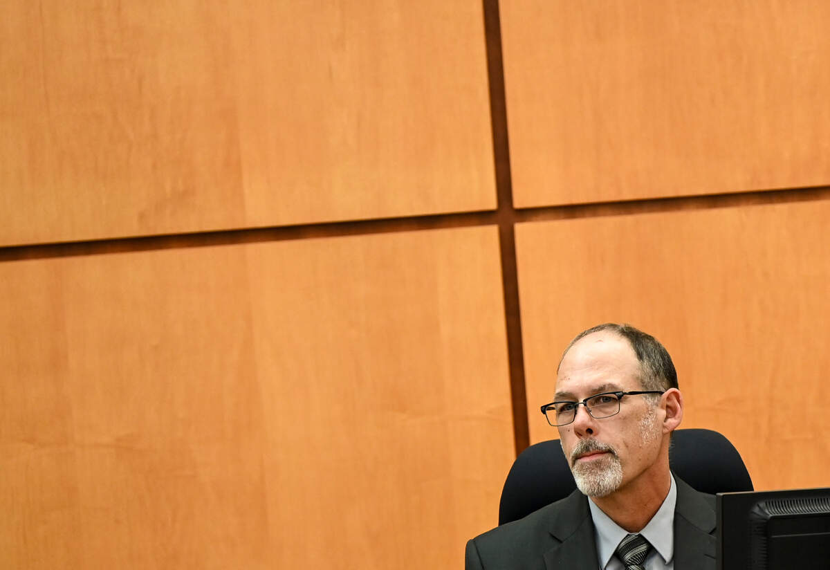 Steven Mell, a Pierce County Sheriff’s Department forensic investigator, testifies during the trial of three Tacoma Police officers in the killing of Manny Ellis at Pierce County Superior Court, Tuesday, Oct. 24, 2023, in Tacoma, Wash.Tacoma Police Officers Christopher Burbank, Matthew Collins and Timothy Rankine stand trial for charges related to the March 2020 killing of Manny Ellis. (Brian Hayes / Pool Photo – The News Tribune)