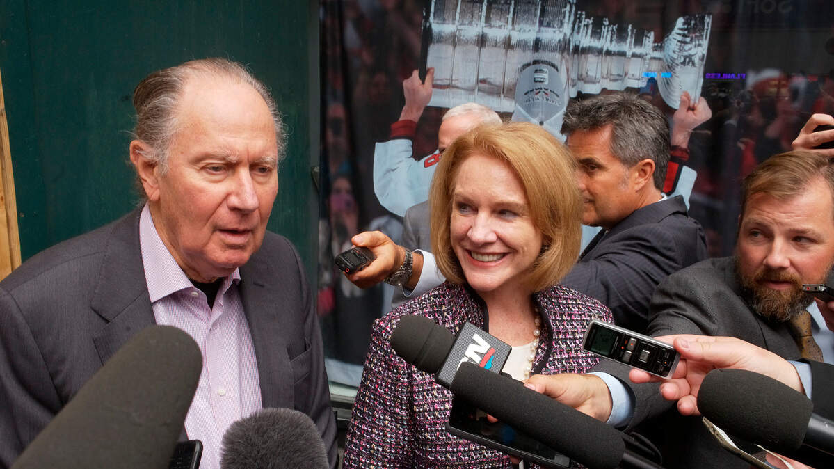Seattle Hockey Partners David Bonderman, left, and Seattle Mayor Jenny Durkan talk to the media as they leave a meeting at National Hockey League headquarters, Tuesday, Oct. 2, 2018, in New York. Members of Seattle’s potential ownership group and Mayor Durkan presented their case to the Board of Governors’ executive committee at the league office. If the executive committee moves the process forward, the board could vote as soon as December to award the NHL’s 32nd franchise to Seattle. (AP Photo/Mark Lennihan)