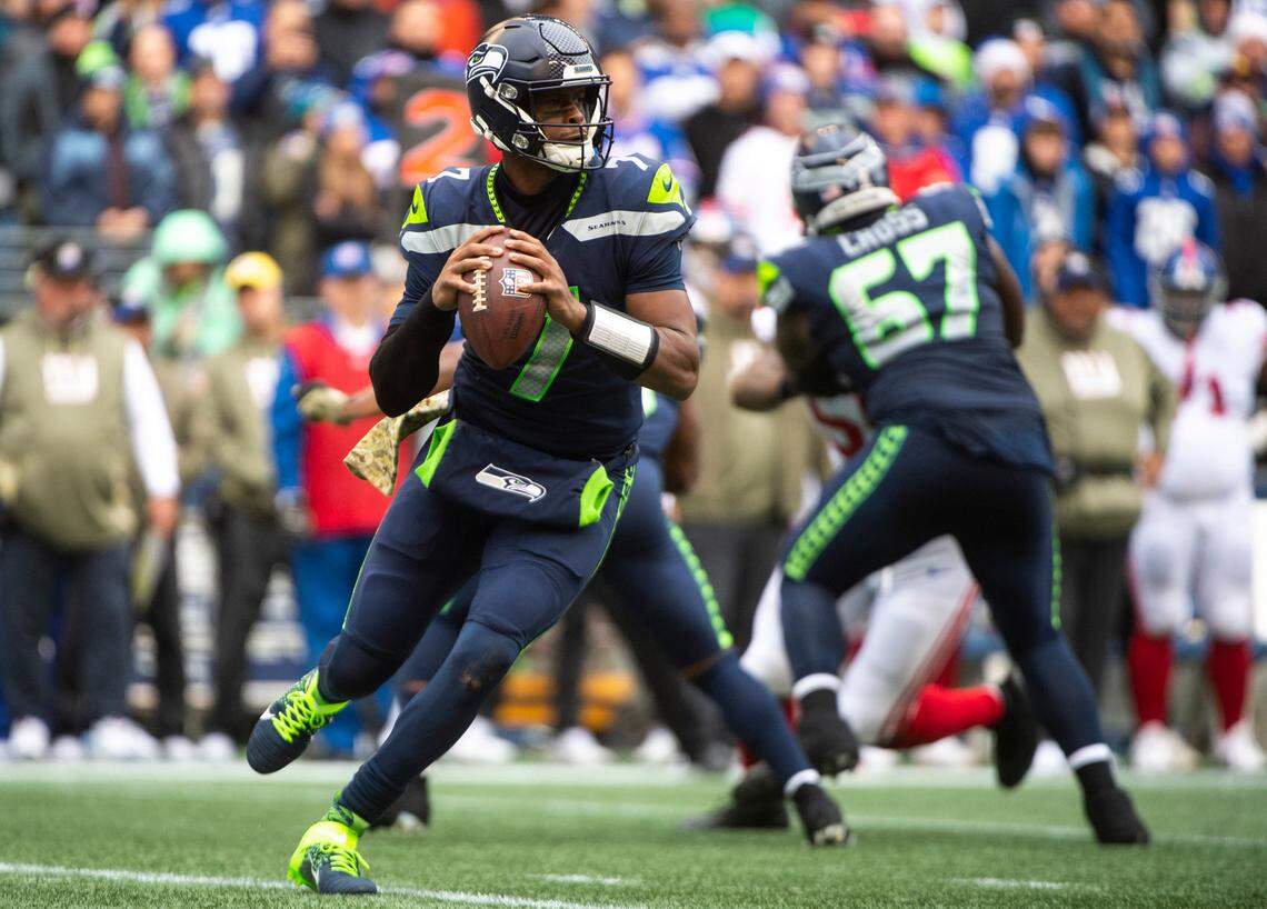 Seattle Seahawks quarterback Geno Smith (7) looks to pass the ball in the second quarter of an NFL game against the New York Giants at Lumen Field in Seattle, Wash. on Oct. 30, 2022. The Seahawks defeated the Giants 27-13.