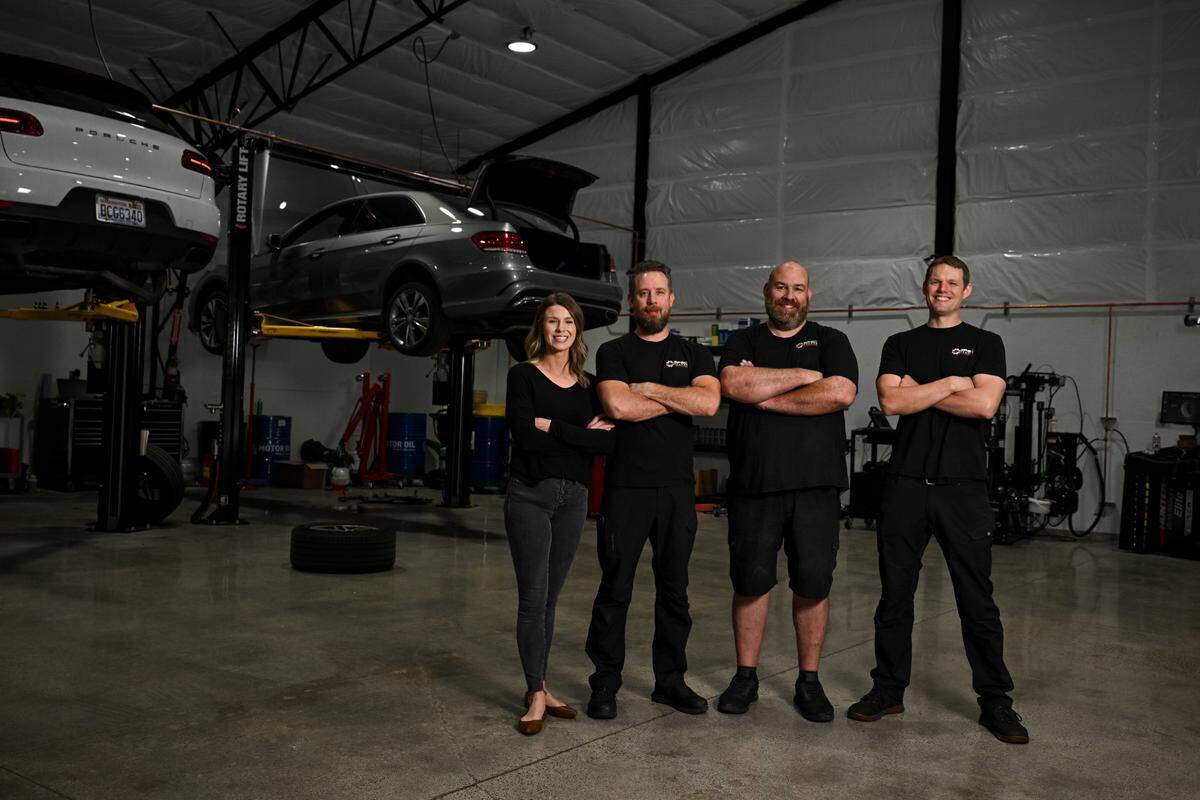 Jamiee Coen, Jacob Coen, Luis Micheri, Jason Edlin at Spec German auto shop, Monday, Sept. 11, 2023, Gig Harbor, Wash.