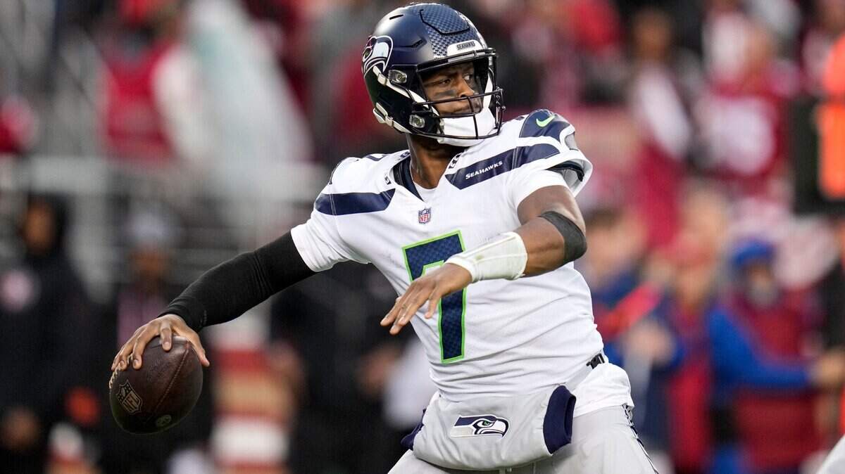 Seattle Seahawks quarterback Geno Smith (7) passes against the San Francisco 49ers during the second half of an NFL wild card playoff football game in Santa Clara, Calif., Saturday, Jan. 14, 2023. (AP Photo/Godofredo A. Vásquez)