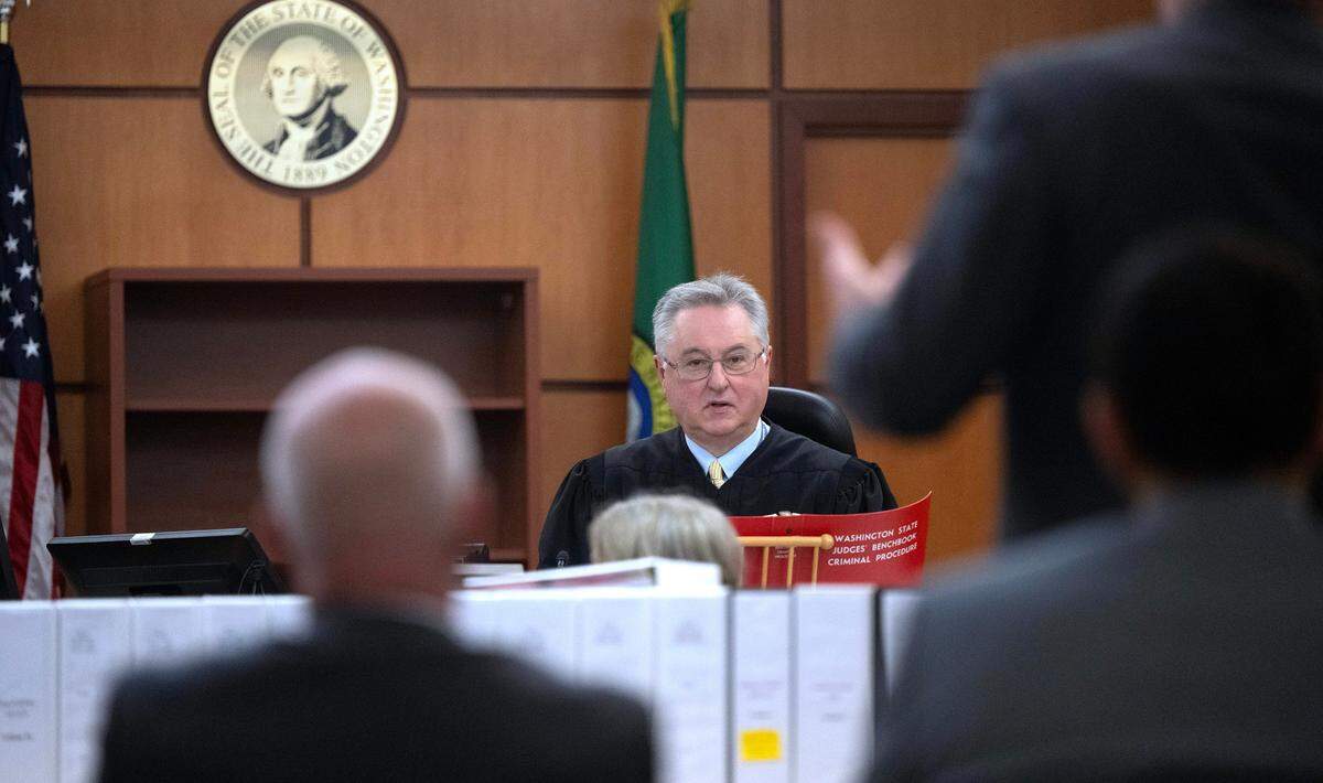 Judge Bryan Chushcoff listens to attorney input during the trial of Tacoma police officers Timothy Rankin, Matthew Collins and Christopher “Shane” Burbank in Pierce County Superior Court in Tacoma, Wash., on Wednesday, Dec. 20, 2023. (Tony Overman / Pool Photo - The News Tribune)