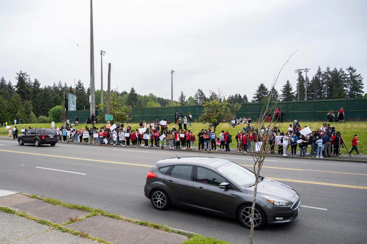 Foss High School students protest against gun violence after conducting a school walkout before their last class of the day on on the corner of South 19th Street and South Tyler Street outside of the Heidelberg Sports Complex on Thursday, May 26, 2022 in Tacoma, Wash.