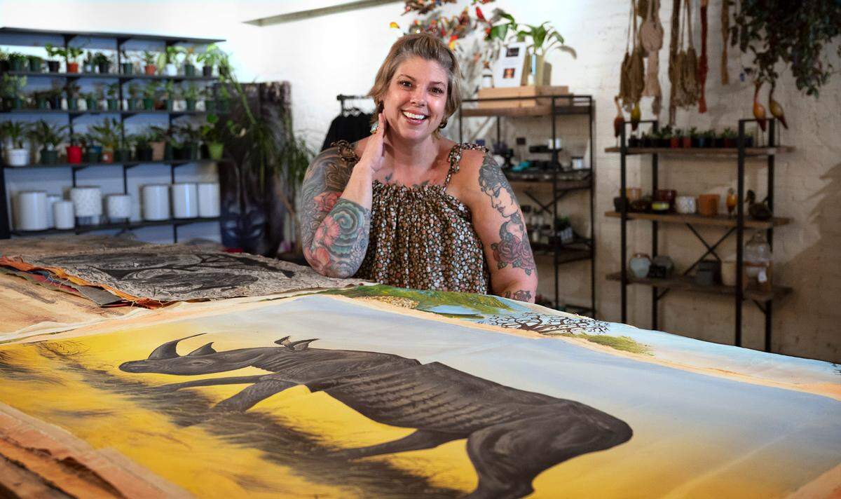 Co-owner Blake Mara at her new Heritage Coffee & Plant House in downtown Tacoma, Washington on Wednesday, June 1, 2022. The multi-faceted shop brings together The Neighorhood Plant Project and the Heritage Art Center along with other local businesses to provide a community gathering space.