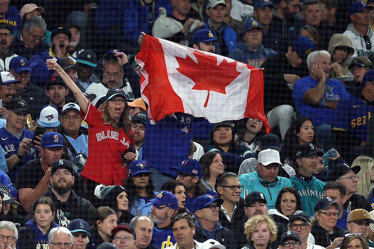 SEATTLE, WASHINGTON - OCTOBER 15: Toronto Blue Jays fans cheer during game three of the American League Championship Series between the Toronto Blue Jays and the Seattle Mariners at T-Mobile Park on October 15, 2025 in Seattle, Washington. (Photo by Steph Chambers/Getty Images)