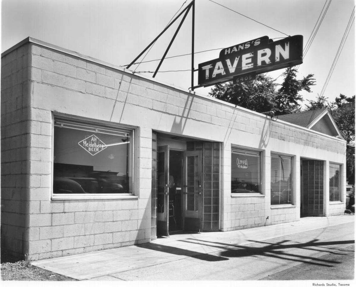 Hans’s Place has served South Tacoma Way since the 1940s. The concrete and glass-block building was photographed on June 29, 1951, with two neon beer signs, for Alt Heidelberg and Olympia, in the windows.