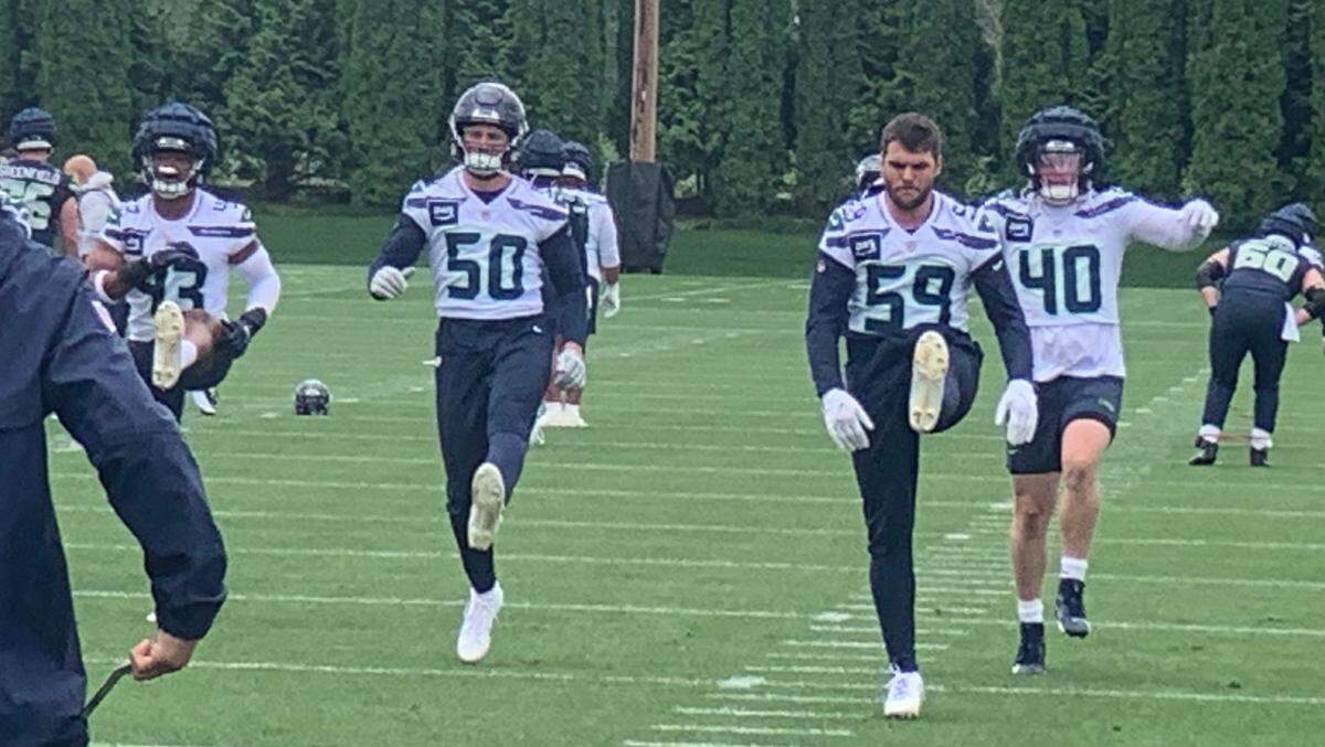 Patrick O’Connell (50) and Jon Rhattigan (59) were the Seahawks’ starting inside linebackers on new coach Mike Macdonald’s defense for the three organized team activities practices (OTAs) that were open to the media at team headquarters in Renton in May into June 2024.