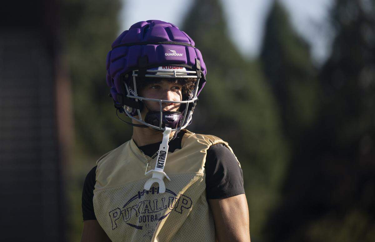 Puyallup wide receiver Jayden Woodland looks on during a Puyallup High School football practice at Sparks Stadium on Thursday, Aug. 21, 2025, in Puyallup, Wash.