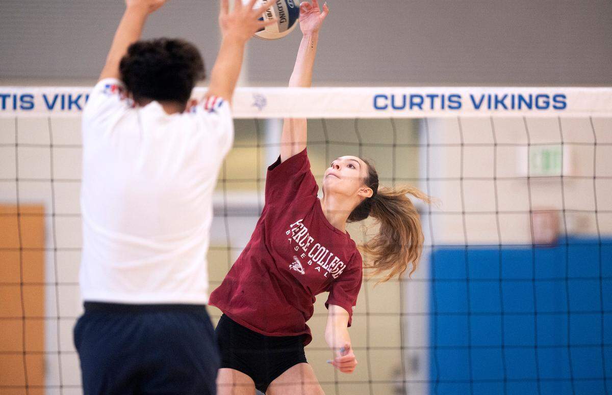 Curtis senior Rudi Reyes fires a shot during volleyball practice at Curtis High School in University Place, Washington, on Wednesday, Nov. 17, 2021.