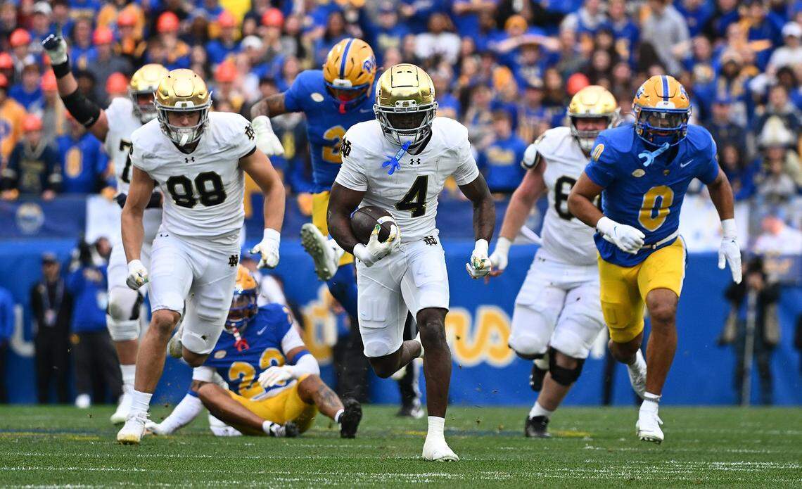 PITTSBURGH, PENNSYLVANIA - NOVEMBER 15: Jeremiyah Love #4 of the Notre Dame Fighting Irish rushes for a touchdown in the first half during the game against the Pittsburgh Panthers at Acrisure Stadium on November 15, 2025 in Pittsburgh, Pennsylvania. (Photo by Justin Berl/Getty Images)