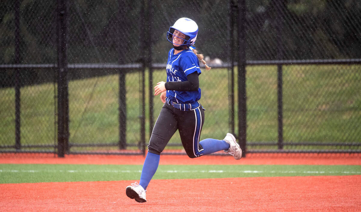 Eatonville’s Hailey Rath smiles as she rounds the bases on a two-run home run during Thursday evening’s 2A SPSL district championship fastpitch game against Franklin Pierce at Foss High School in Tacoma, Washington, on Thursday, May 6, 2021.