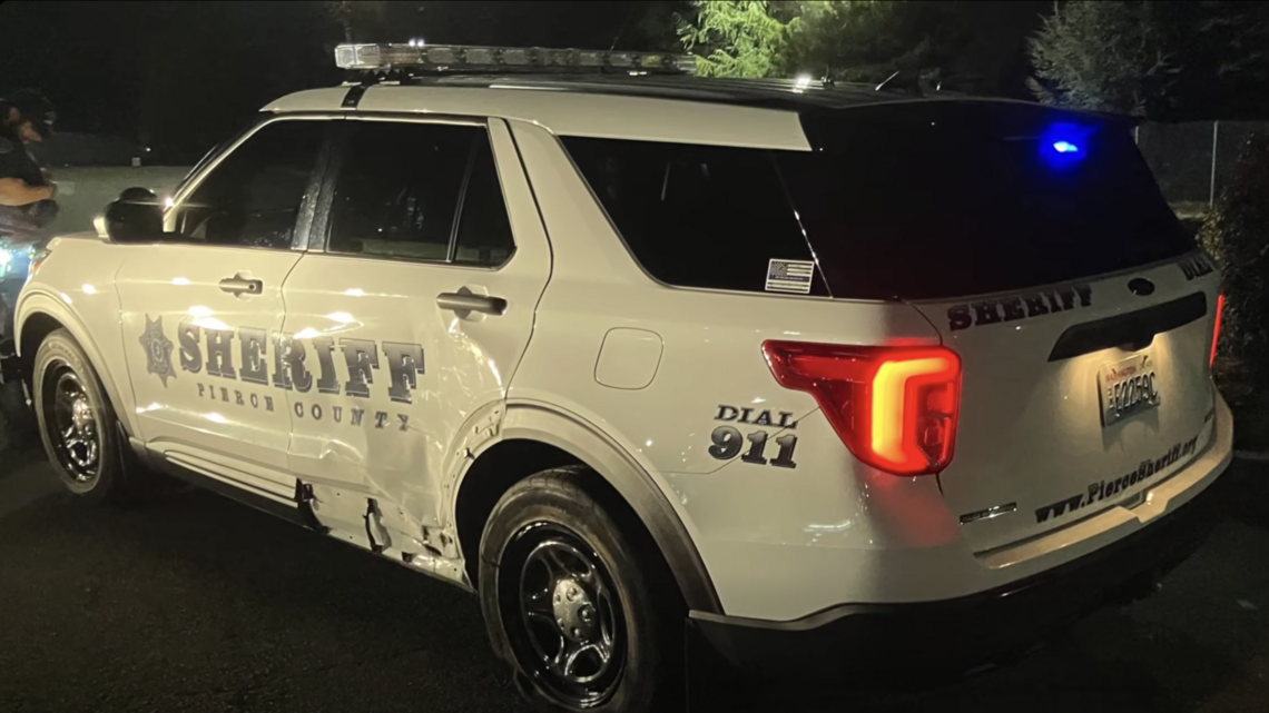 Car fleeing drive-by shooting collides with cop car; two people arrested