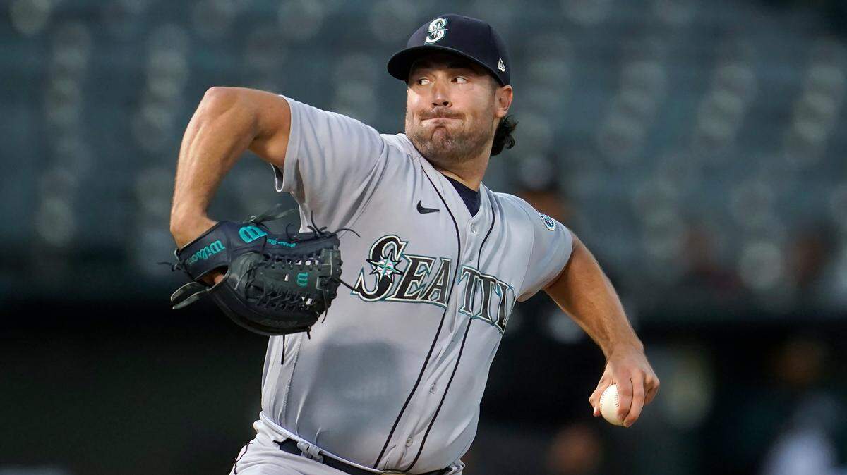 Seattle Mariners’ Robbie Ray pitches against the Oakland Athletics during the first inning of a baseball game in Oakland, Calif., Wednesday, Sept. 21, 2022. (AP Photo/Jeff Chiu)