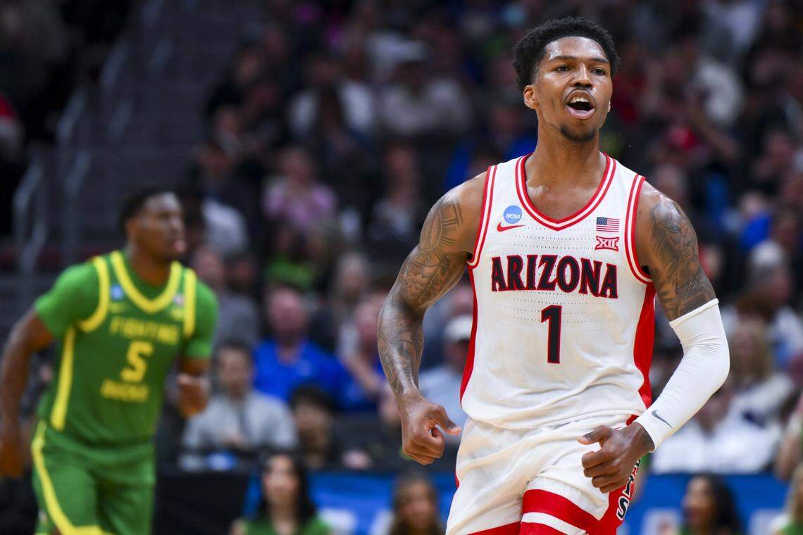 Arizona Wildcats guard Caleb Love (1) reacts against the Oregon Ducks in the first half of their second-round NCAA tournament game at Climate Pledge Arena in Seattle Sunday, March 23, 2025. Mandatory Credit: Steven Bisig-Imagn Images