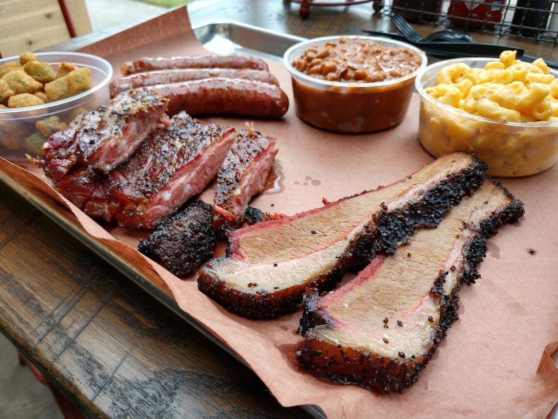 The family tray at BBQ2U comes with a choice of three meats and three sides.